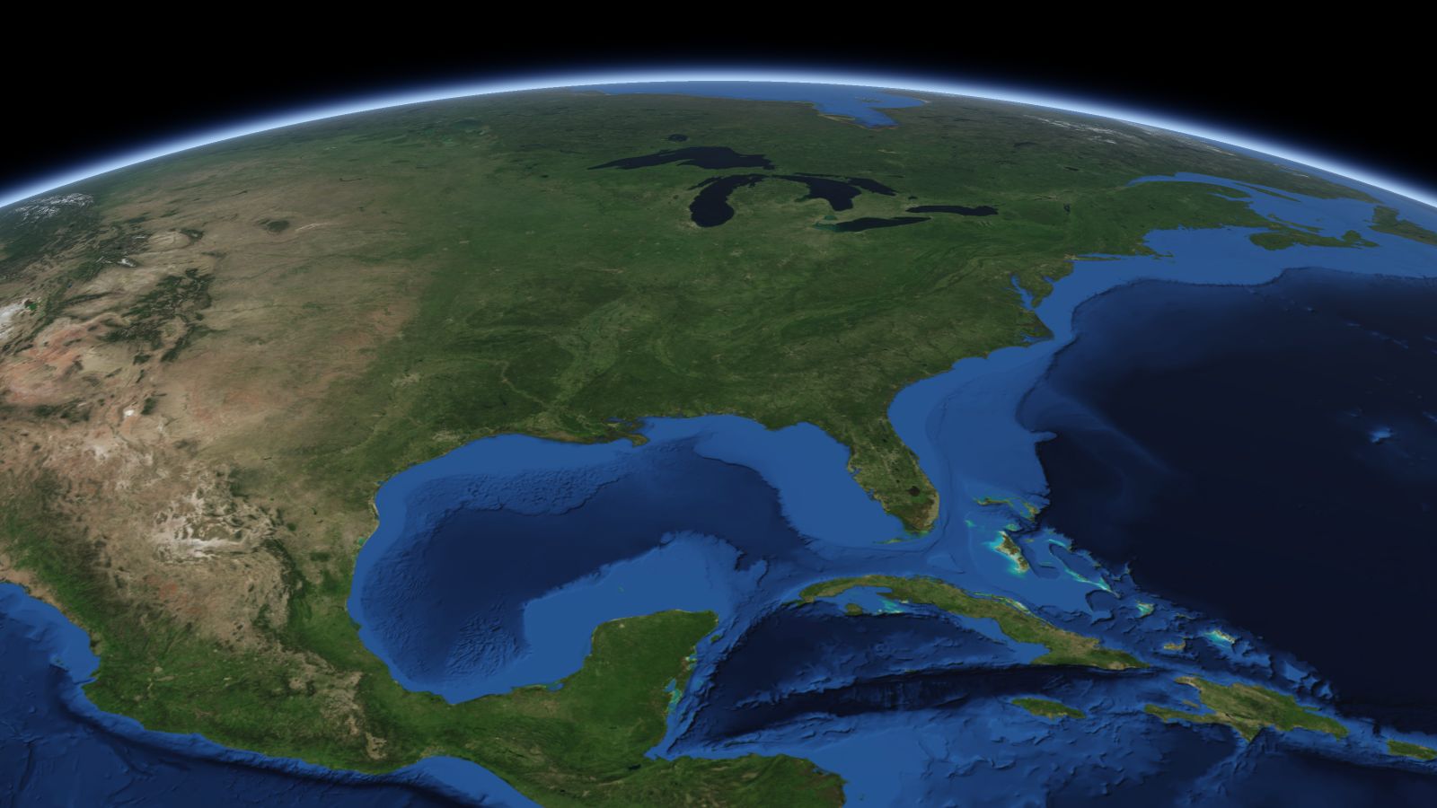 The curve of the Earth seen from orbit, with Birmingham ringed in amber near the middle of the picture.