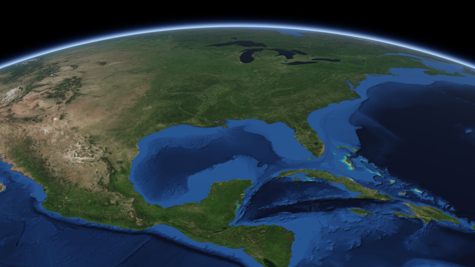The curve of the Earth seen from orbit, with Mobile ringed in amber near the middle of the picture.