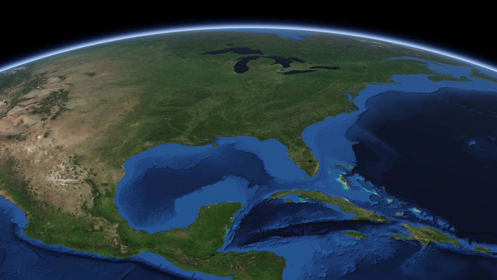 The curve of the Earth seen from orbit, with Montgomery ringed in amber near the middle of the picture.