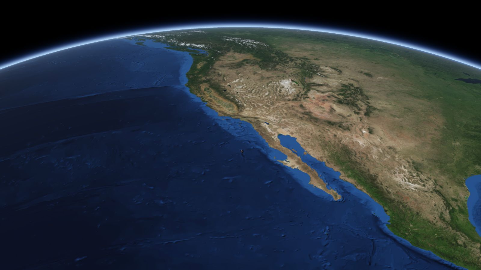 The curve of the Earth seen from orbit, with Los Angeles ringed in amber near the middle of the picture.