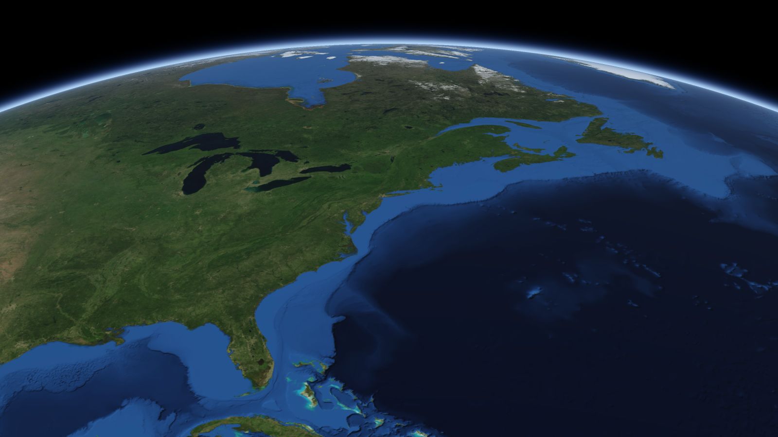 The curve of the Earth seen from orbit, with Stamford ringed in amber near the middle of the picture.