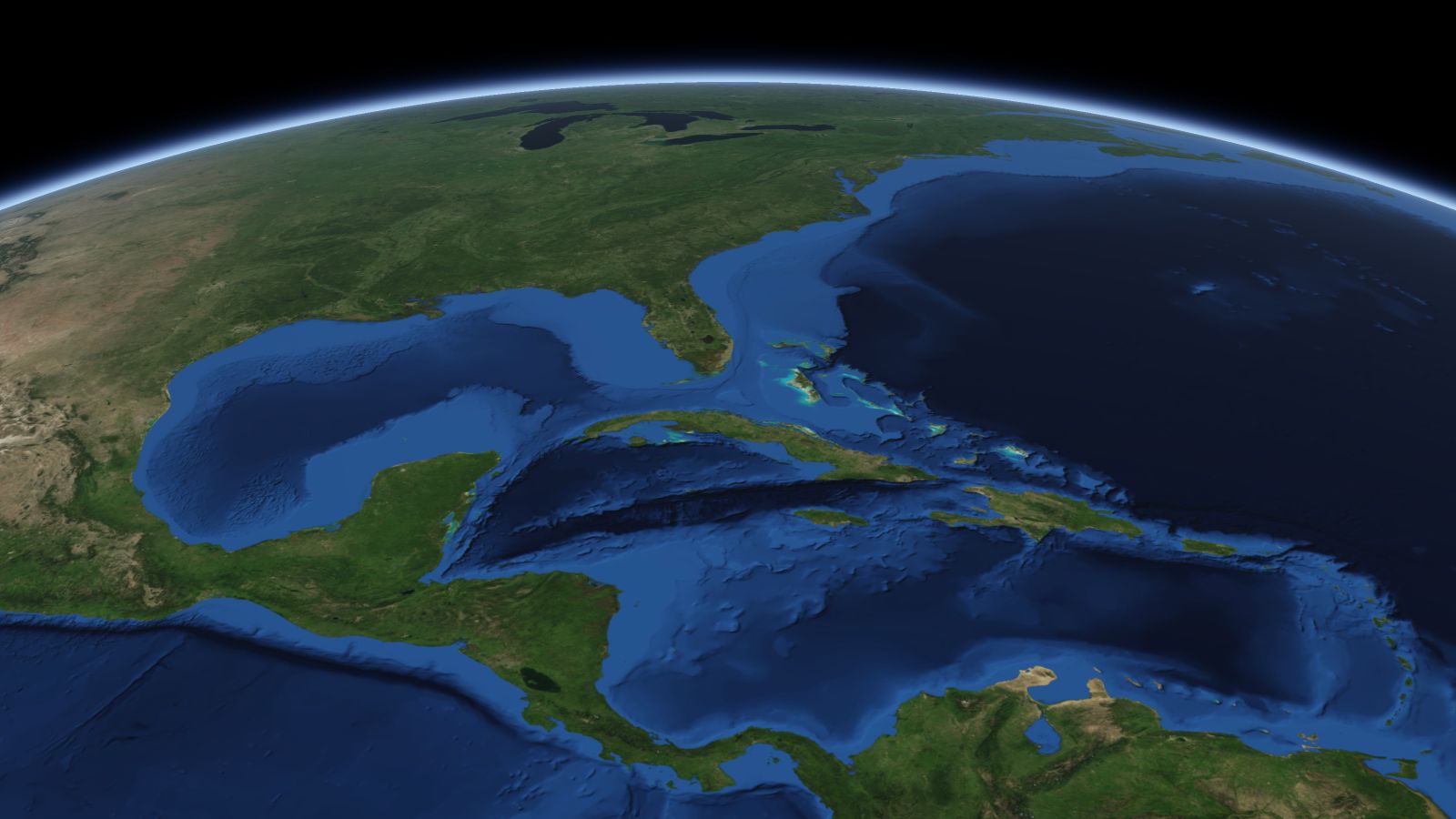 The curve of the Earth seen from orbit, with Miami ringed in amber near the middle of the picture.