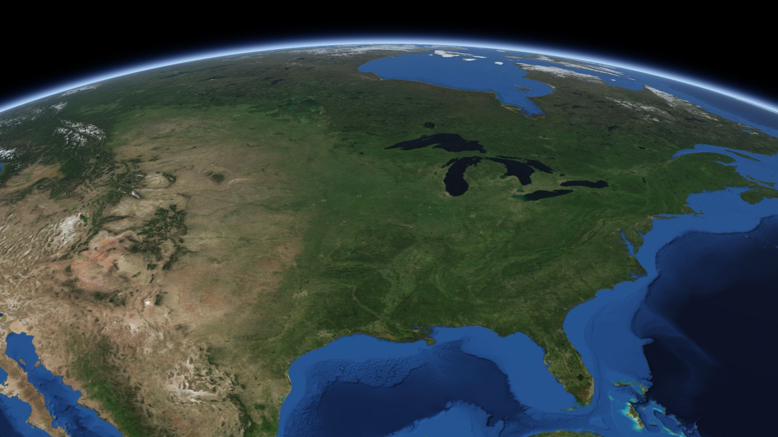 The curve of the Earth seen from orbit, with Cedar Rapids ringed in amber near the middle of the picture.