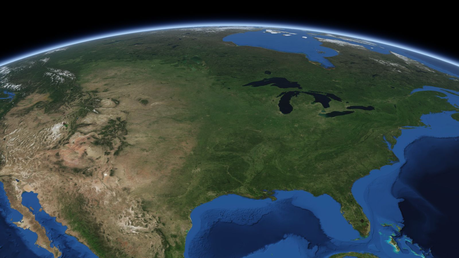 The curve of the Earth seen from orbit, with Des Moines ringed in amber near the middle of the picture.