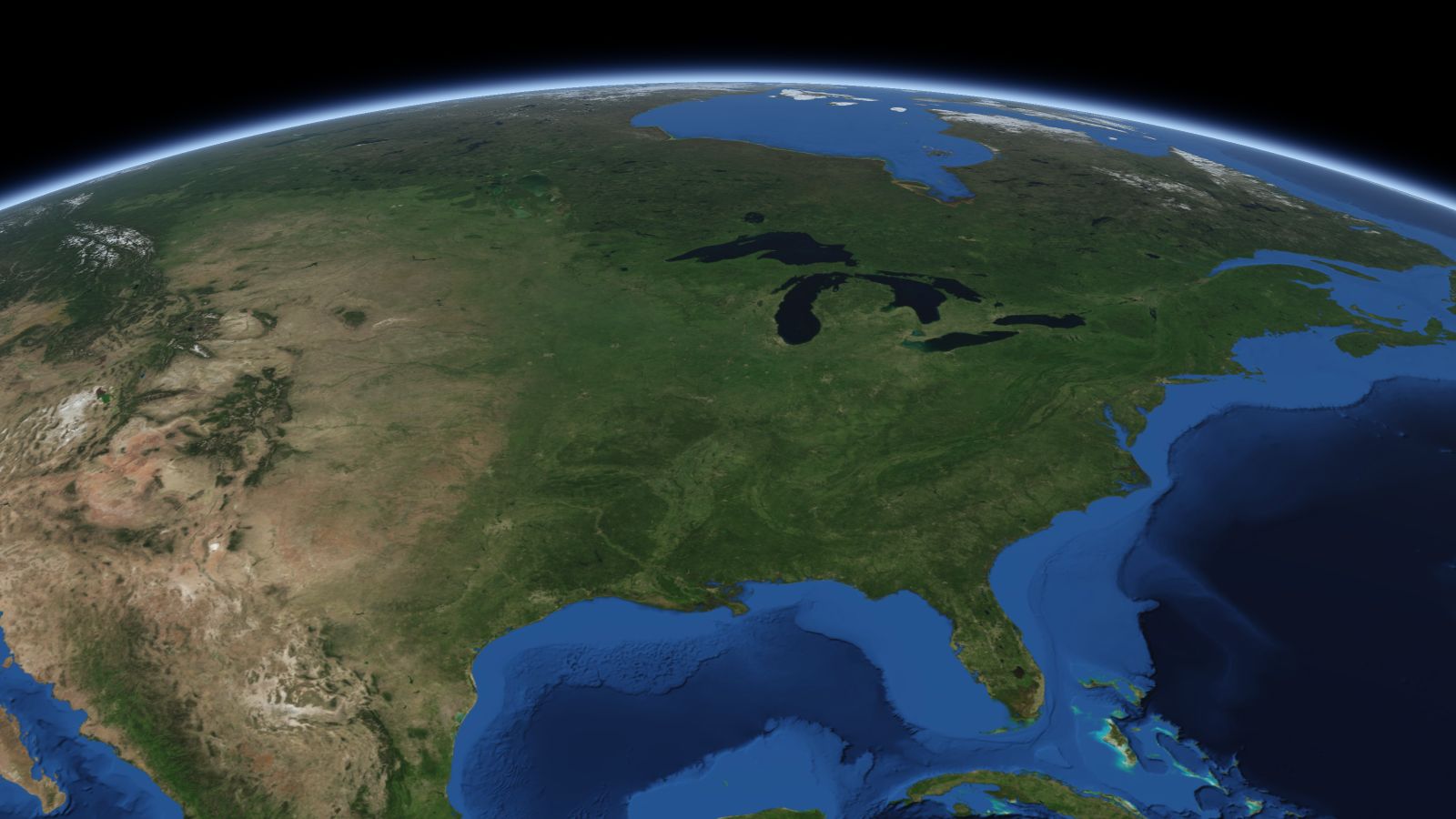 The curve of the Earth seen from orbit, with Peoria ringed in amber near the middle of the picture.