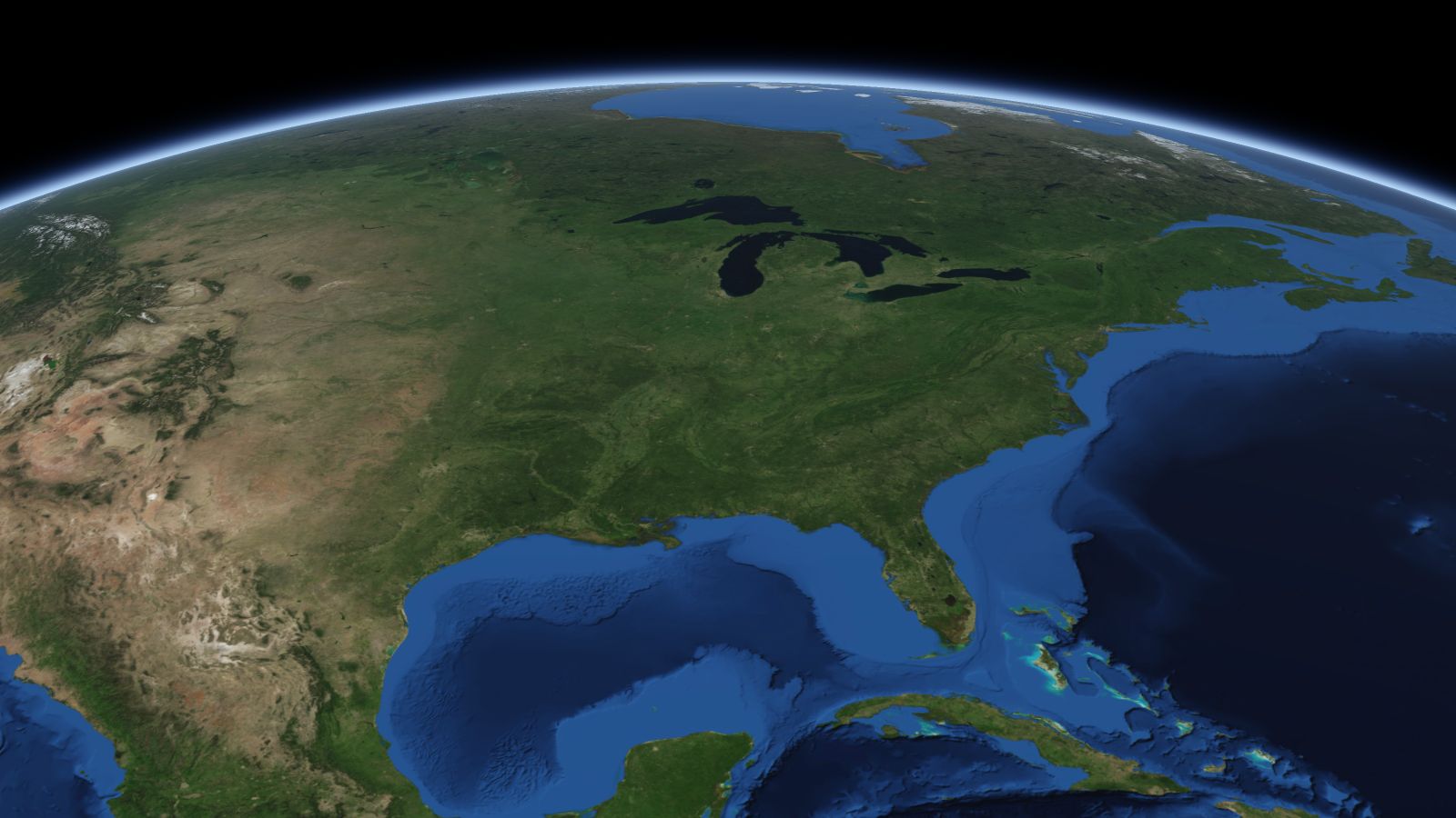 The curve of the Earth seen from orbit, with Evansville ringed in amber near the middle of the picture.