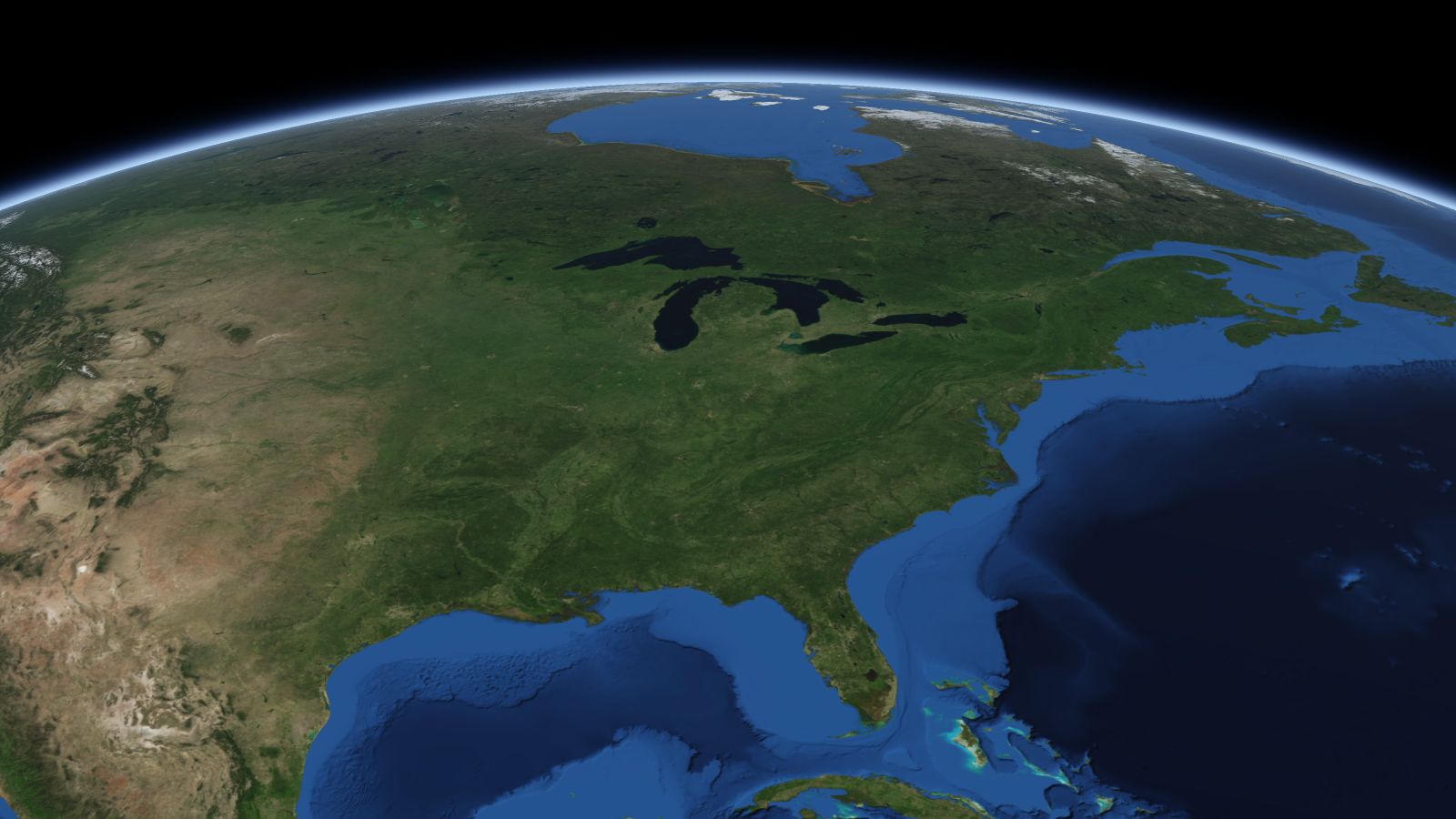 The curve of the Earth seen from orbit, with Fort Wayne ringed in amber near the middle of the picture.