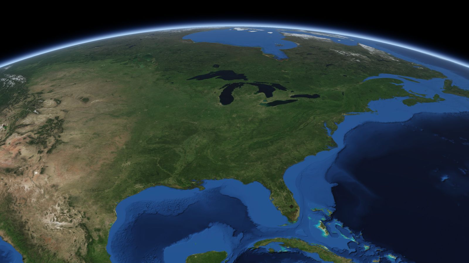The curve of the Earth seen from orbit, with Indianapolis ringed in amber near the middle of the picture.