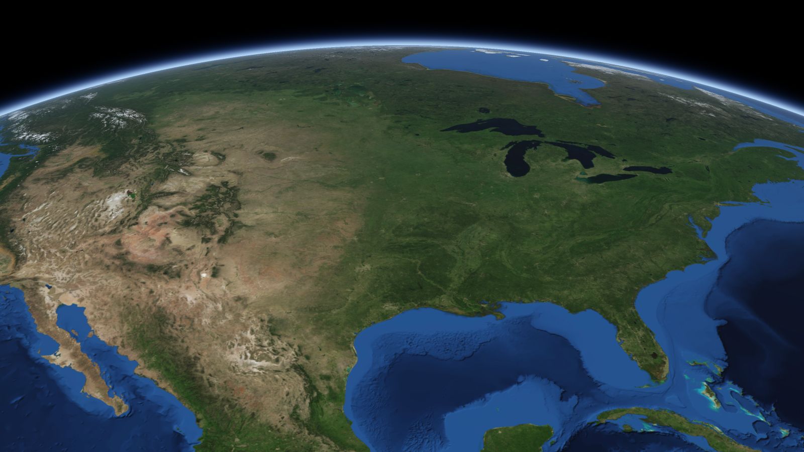 The curve of the Earth seen from orbit, with Kansas City ringed in amber near the middle of the picture.