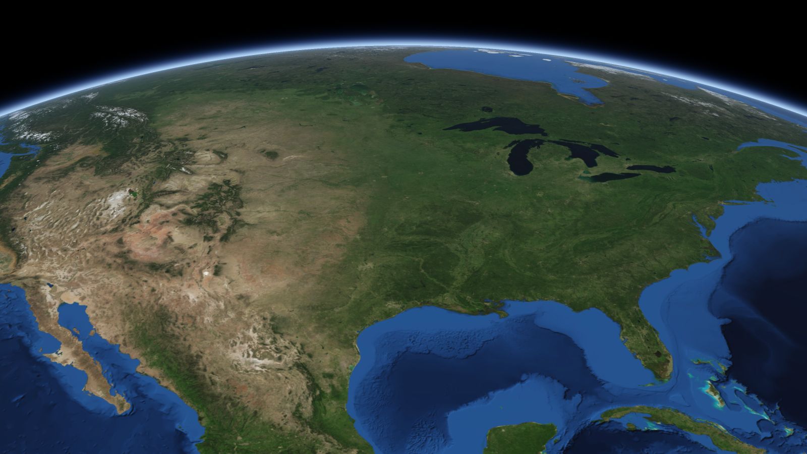 The curve of the Earth seen from orbit, with Olathe ringed in amber near the middle of the picture.