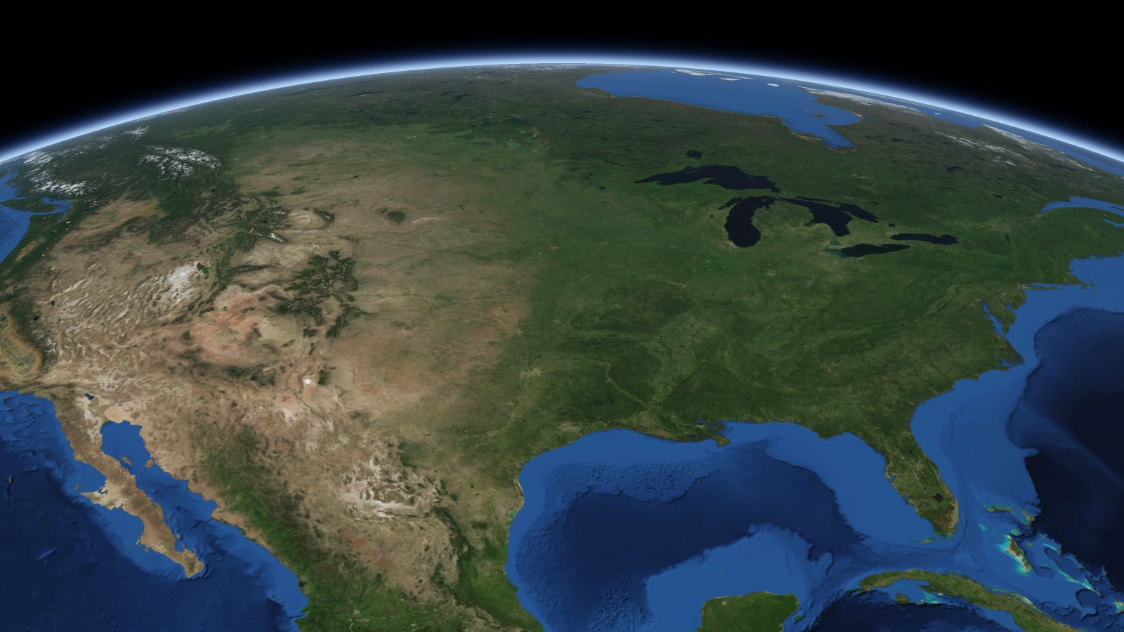 The curve of the Earth seen from orbit, with Topeka ringed in amber near the middle of the picture.