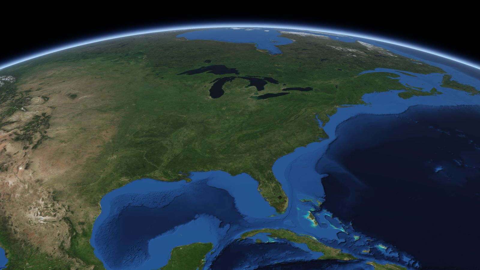 The curve of the Earth seen from orbit, with Lexington ringed in amber near the middle of the picture.