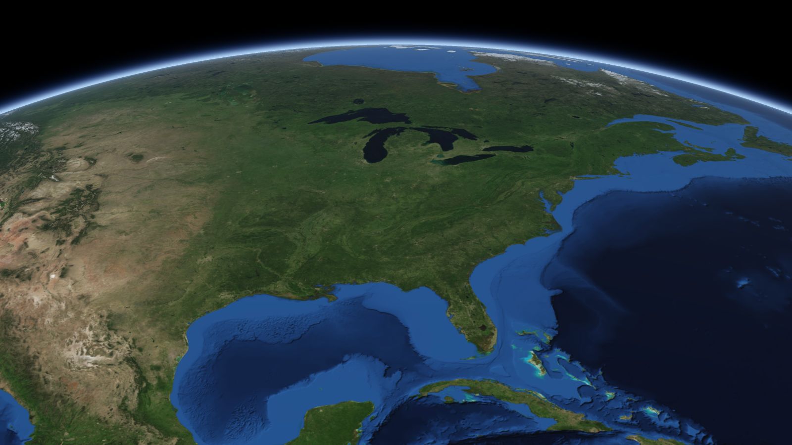 The curve of the Earth seen from orbit, with Louisville ringed in amber near the middle of the picture.