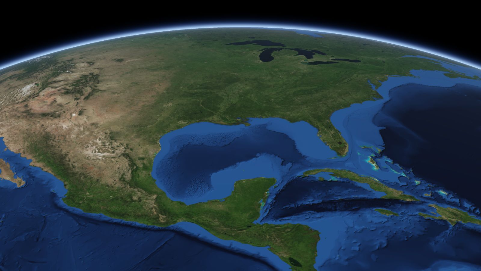 The curve of the Earth seen from orbit, with New Orleans ringed in amber near the middle of the picture.