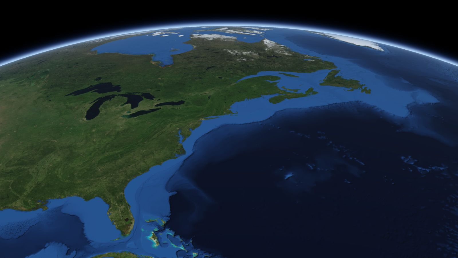 The curve of the Earth seen from orbit, with New Bedford ringed in amber near the middle of the picture.