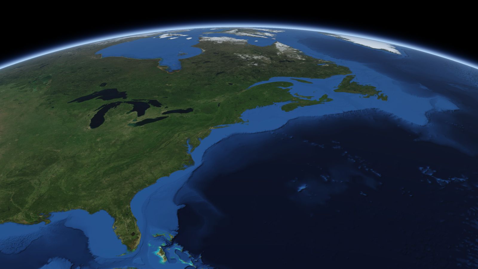 The curve of the Earth seen from orbit, with Quincy ringed in amber near the middle of the picture.
