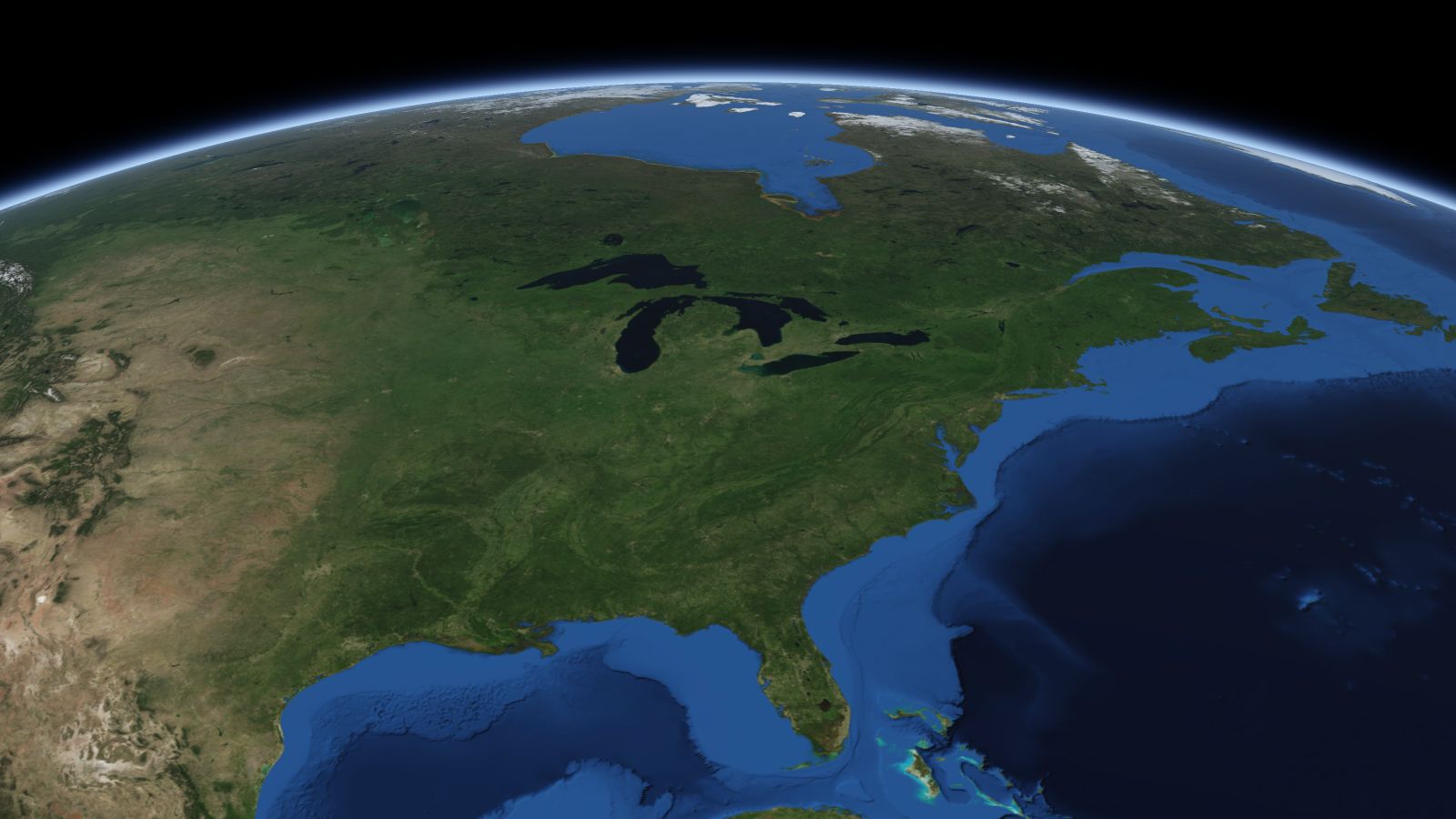 The curve of the Earth seen from orbit, with Ann Arbor ringed in amber near the middle of the picture.