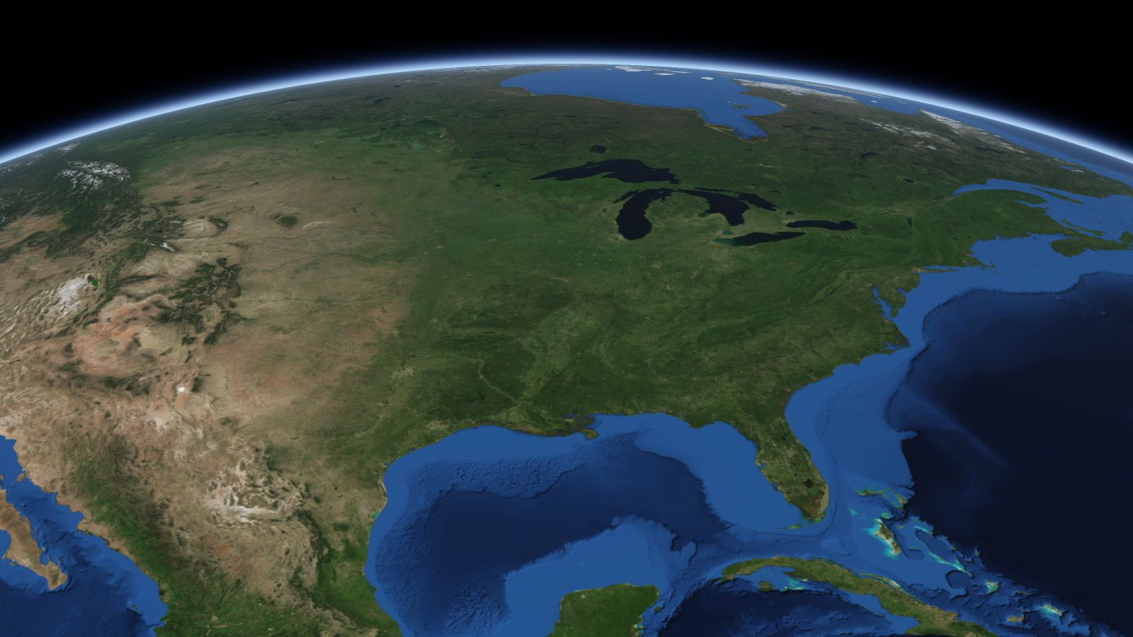 The curve of the Earth seen from orbit, with St. Louis ringed in amber near the middle of the picture.