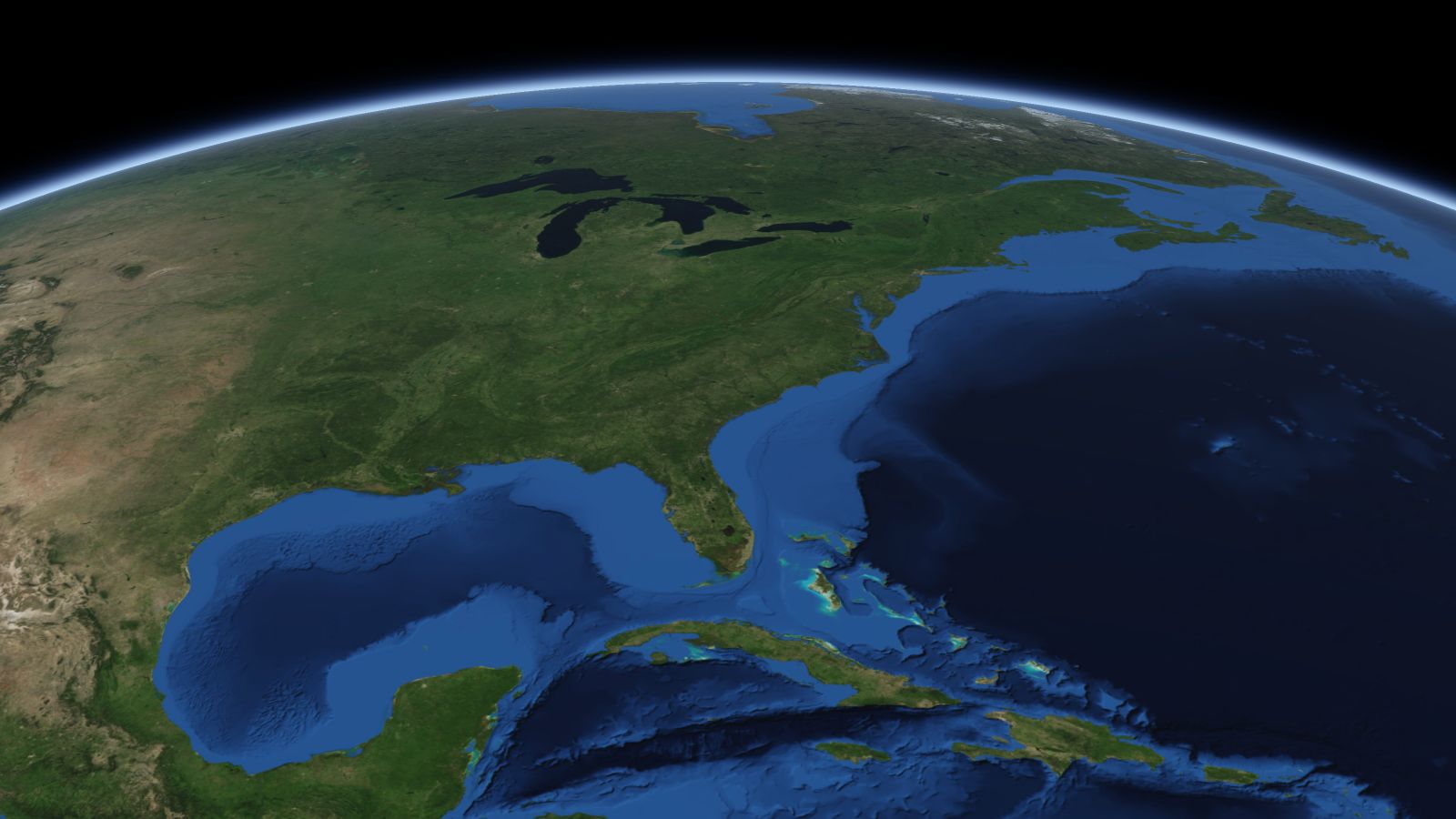 The curve of the Earth seen from orbit, with Charlotte ringed in amber near the middle of the picture.