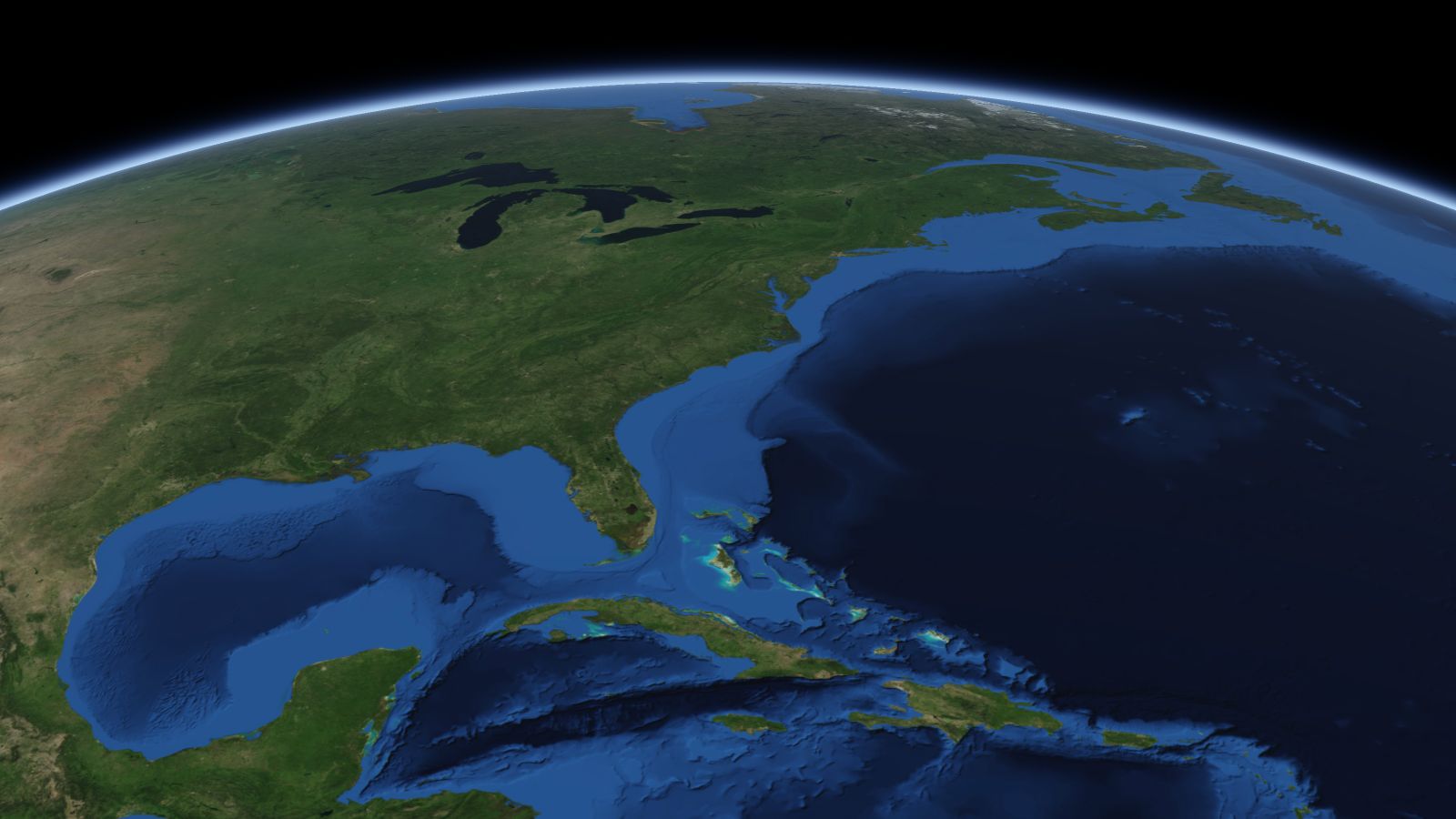 The curve of the Earth seen from orbit, with Wilmington ringed in amber near the middle of the picture.