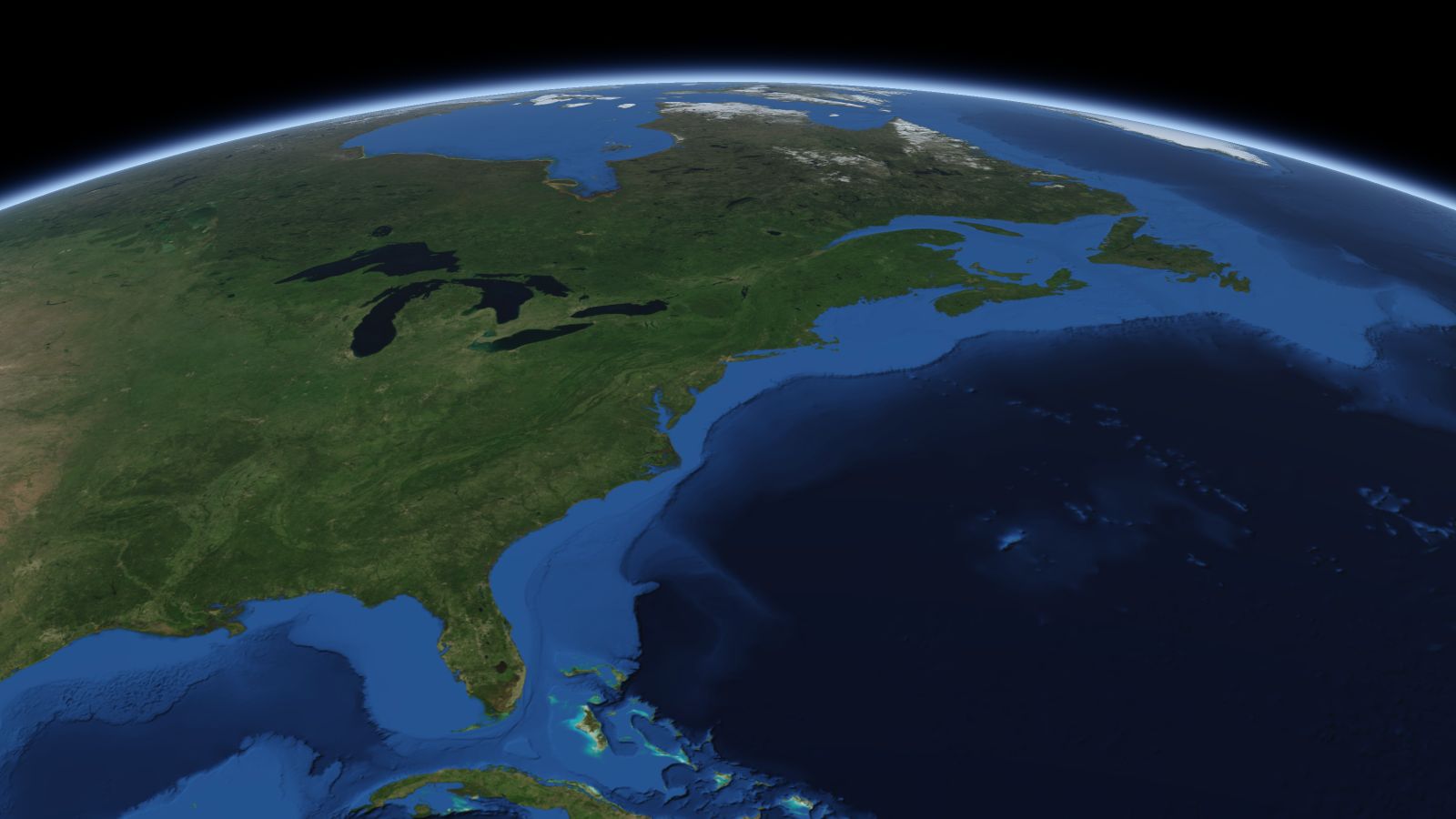 The curve of the Earth seen from orbit, with New York ringed in amber near the middle of the picture.