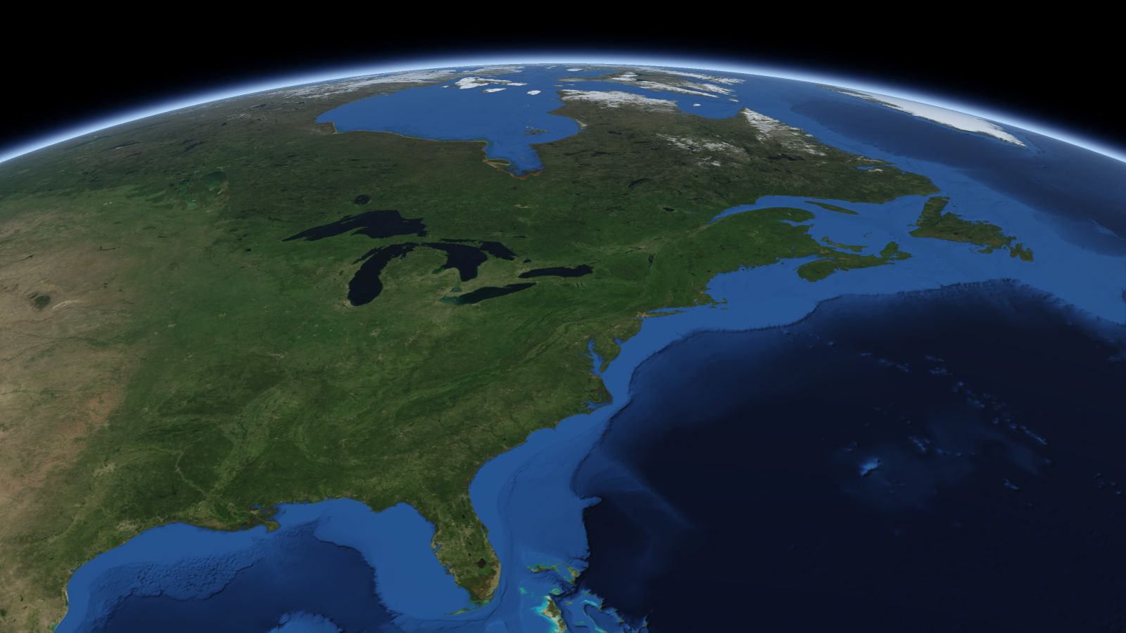The curve of the Earth seen from orbit, with Rochester ringed in amber near the middle of the picture.