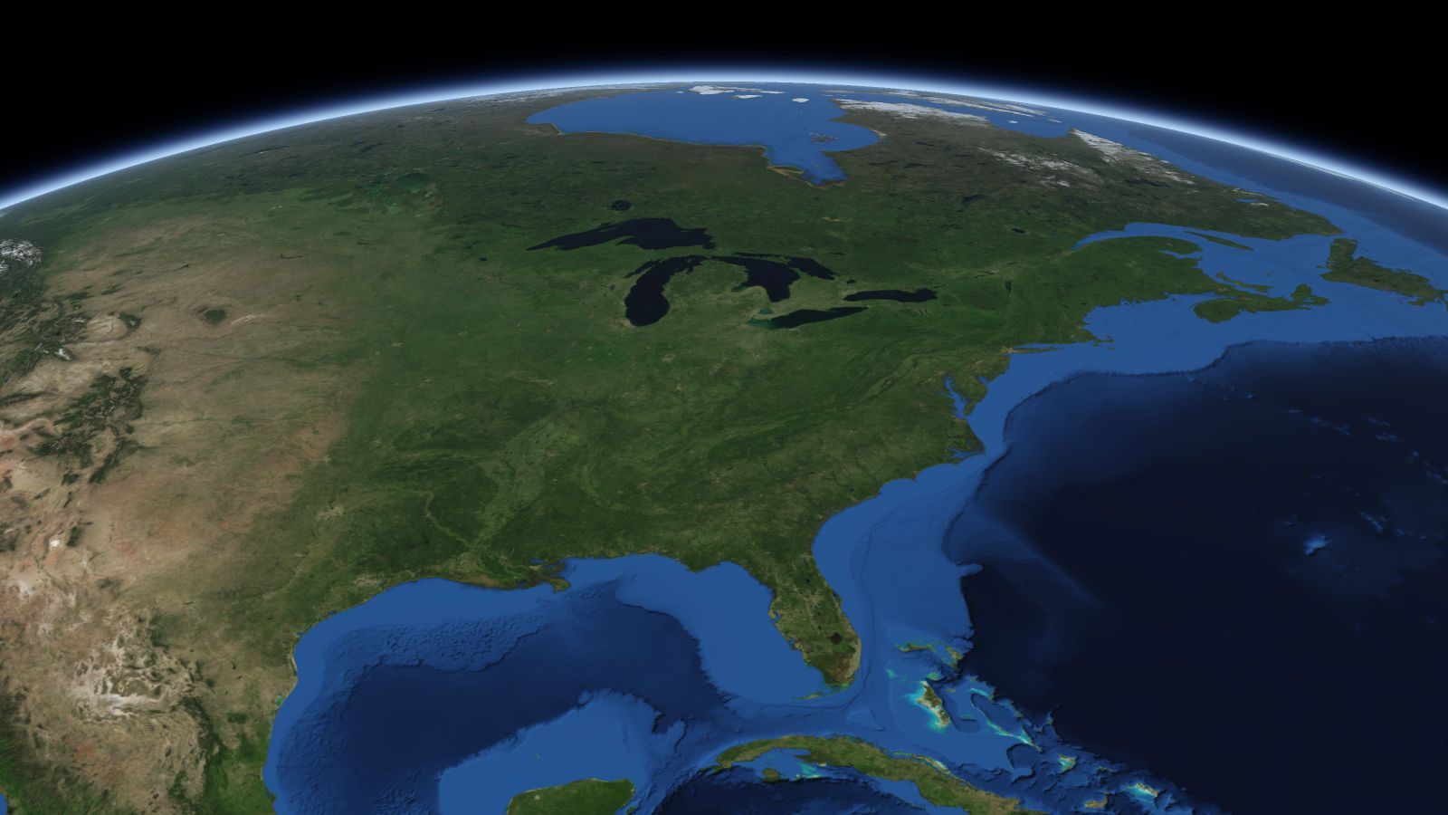 The curve of the Earth seen from orbit, with Dayton ringed in amber near the middle of the picture.