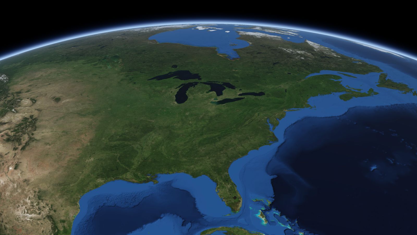 The curve of the Earth seen from orbit, with Toledo ringed in amber near the middle of the picture.
