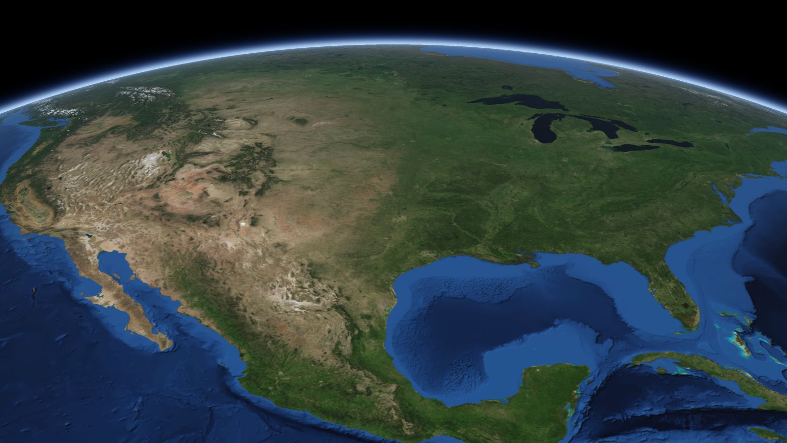 The curve of the Earth seen from orbit, with Norman ringed in amber near the middle of the picture.