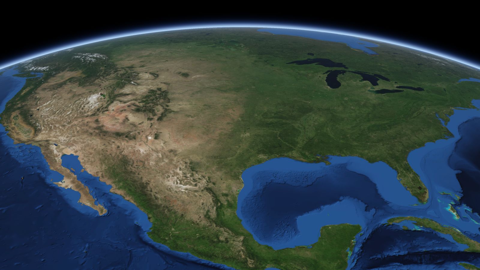 The curve of the Earth seen from orbit, with Oklahoma City ringed in amber near the middle of the picture.