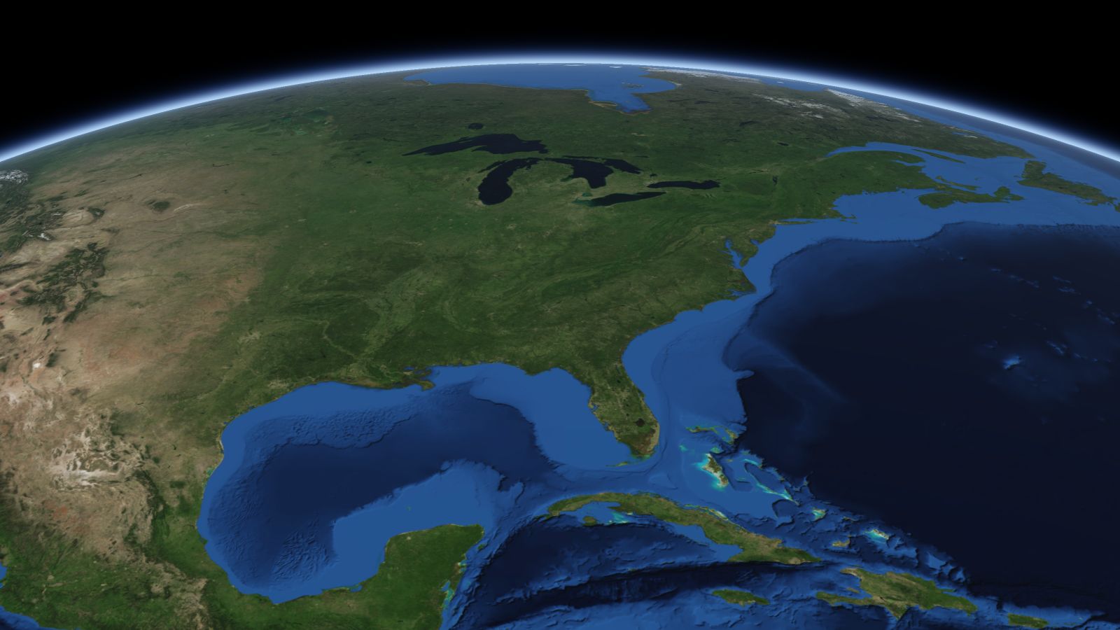 The curve of the Earth seen from orbit, with Knoxville ringed in amber near the middle of the picture.