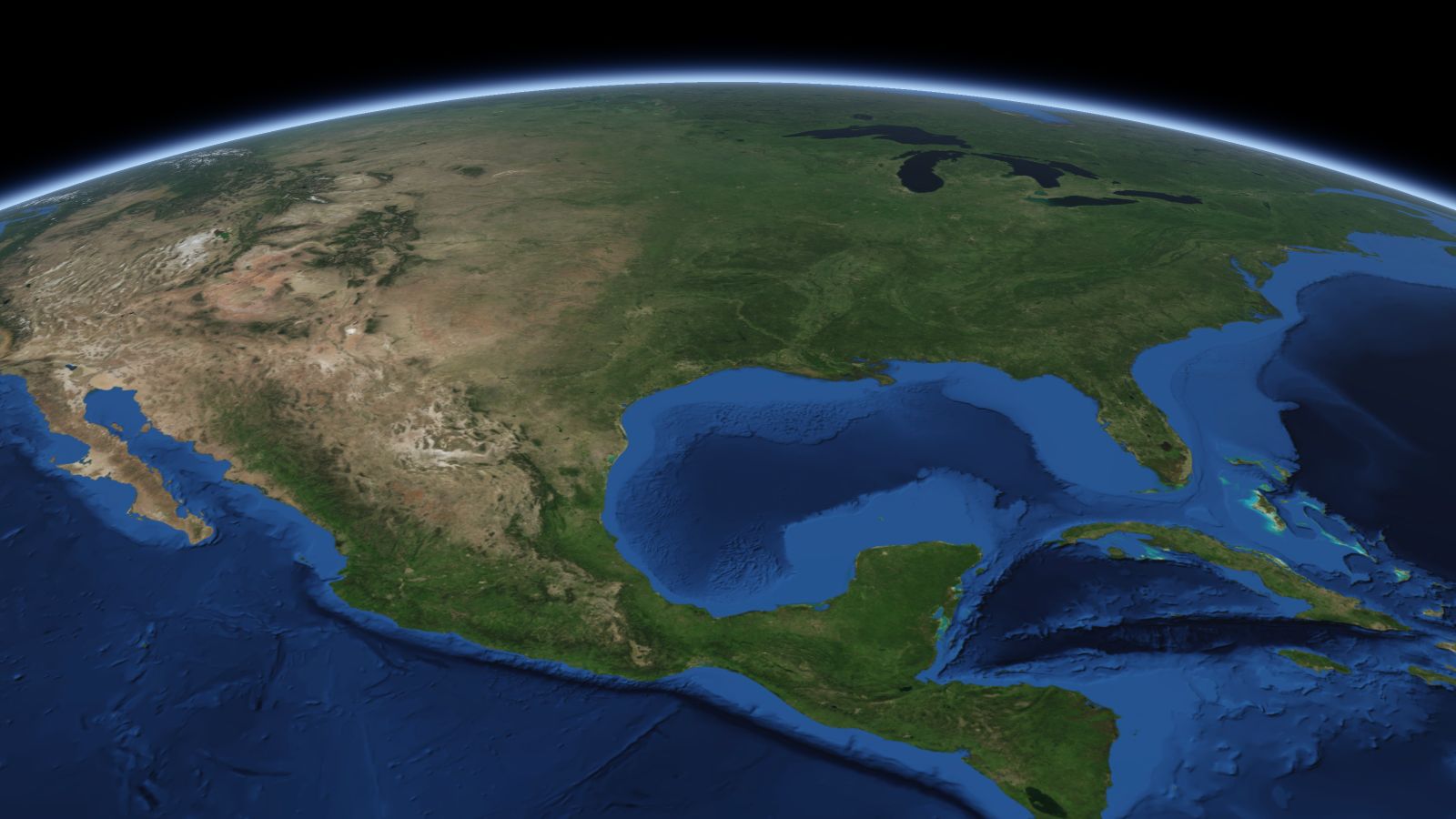 The curve of the Earth seen from orbit, with Beaumont ringed in amber near the middle of the picture.