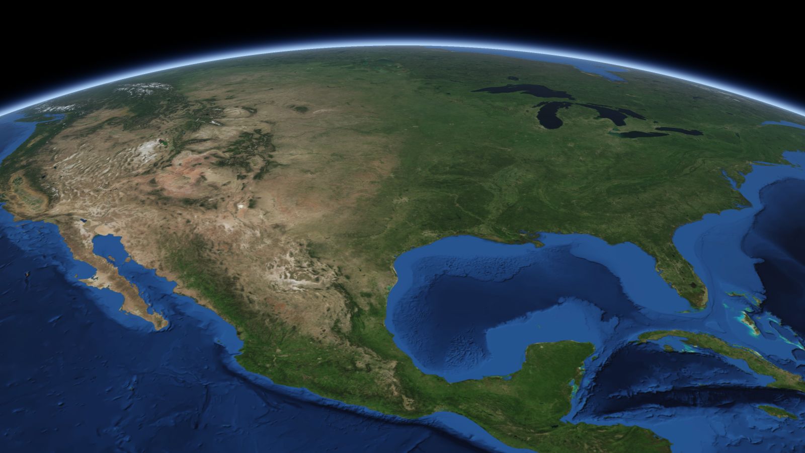 The curve of the Earth seen from orbit, with Carrollton ringed in amber near the middle of the picture.