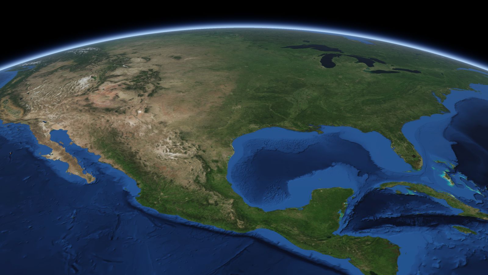 The curve of the Earth seen from orbit, with College Station ringed in amber near the middle of the picture.