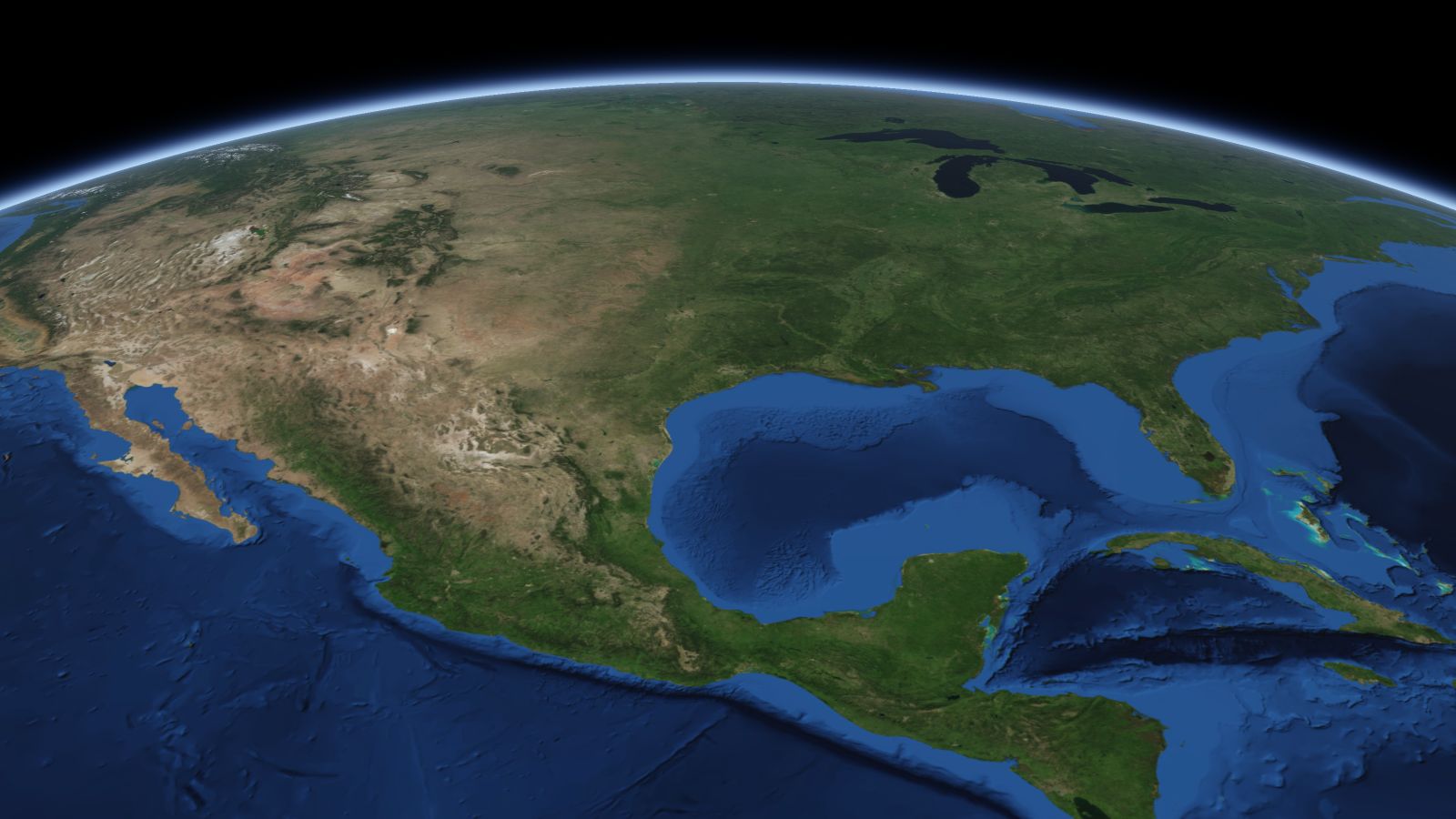 The curve of the Earth seen from orbit, with Conroe ringed in amber near the middle of the picture.