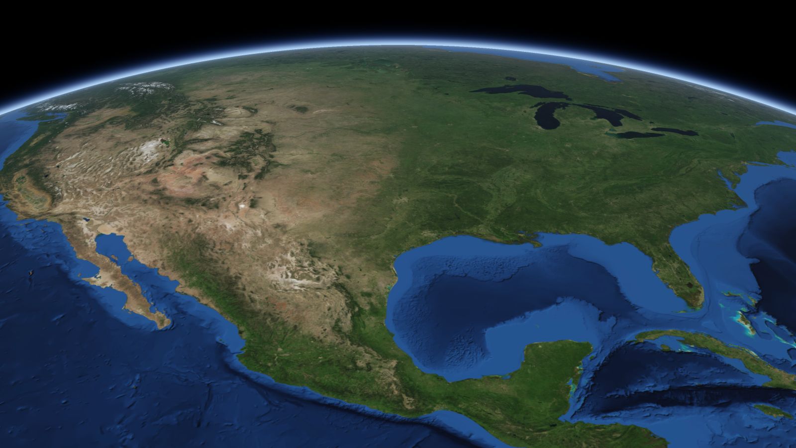 The curve of the Earth seen from orbit, with Denton ringed in amber near the middle of the picture.
