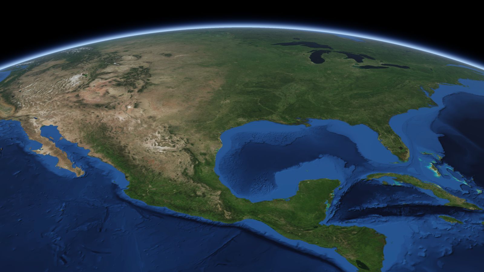 The curve of the Earth seen from orbit, with Houston ringed in amber near the middle of the picture.