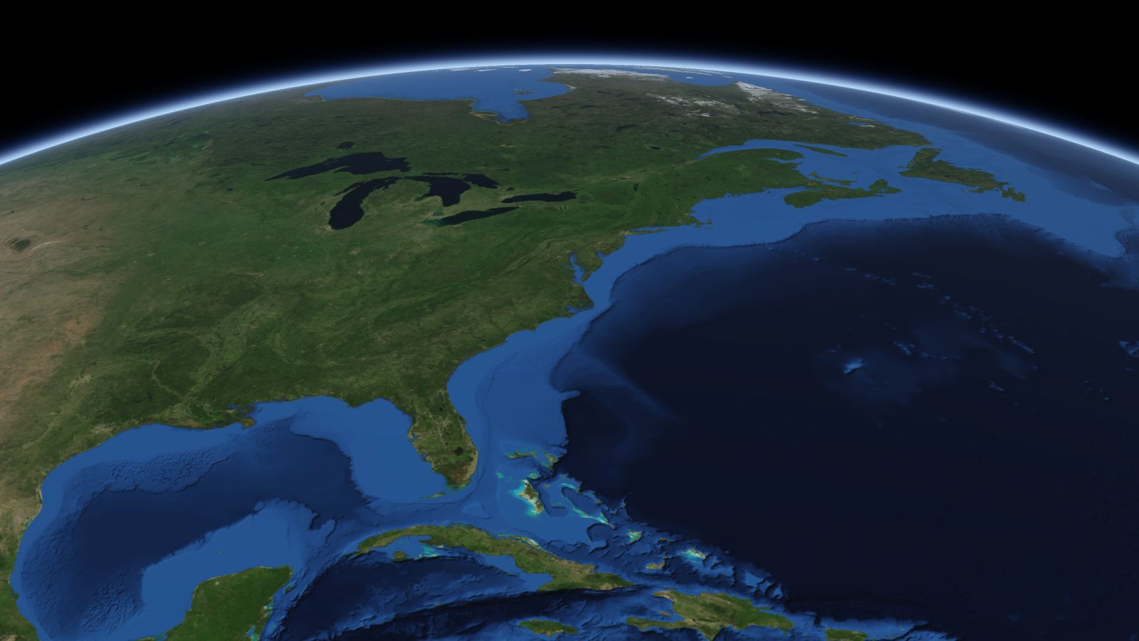 The curve of the Earth seen from orbit, with Newport News ringed in amber near the middle of the picture.