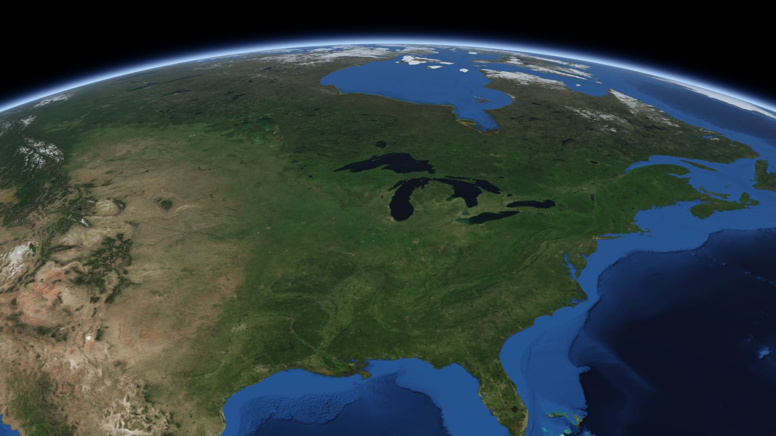 The curve of the Earth seen from orbit, with Green Bay ringed in amber near the middle of the picture.